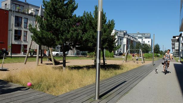Small playground in Malmö, Sweden, blends into the surroundings emphasizing the marine atmosphere of the area.